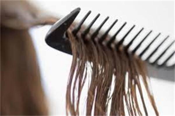 a wide-tooth comb for human hair wigs